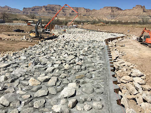 Backhoes on construction site at the Green River.