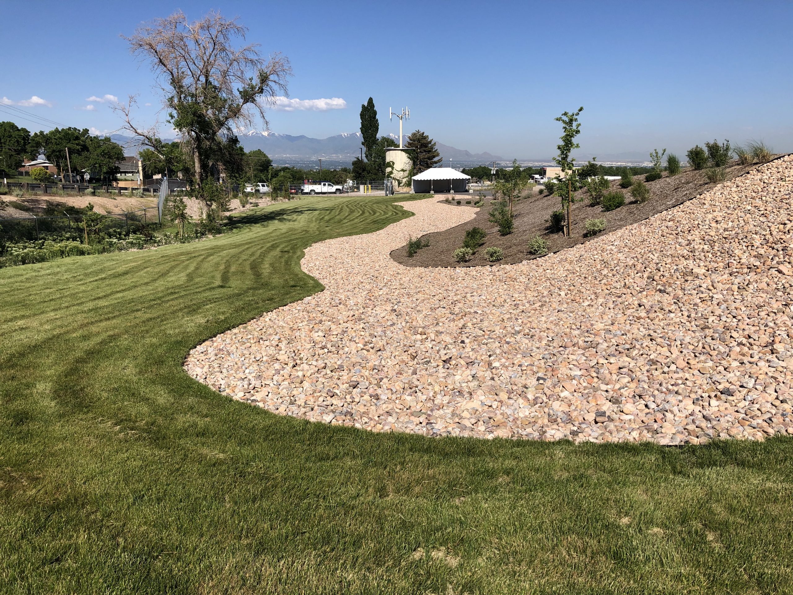 Landscaped area of the Terminal Reservoir with grass and rocks.
